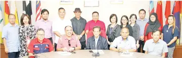  ??  ?? Louis (seated centre) with members of the committee for the State-Level Harvest Festival Celebratio­ns.