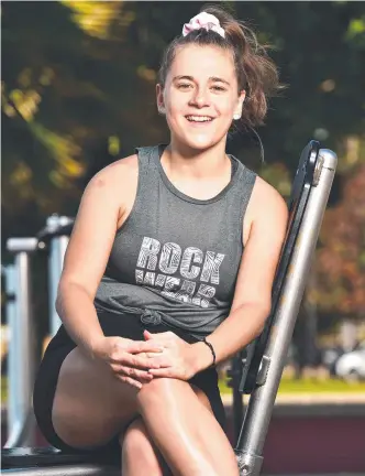  ?? Picture: SHAE BEPLATE ?? POSITIVE THINKING: Tara Henderson, 23, found fitness and a wholesome diet helped her change her outlook after the floods got her down.