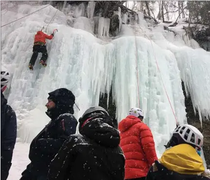  ?? PHOTO COURTESY OF MICHIGAN DNR ?? Michigan Office of Outdoor Industry Director Brad Garmon traveled to Michigan Ice Fest, an annual ice climbing festival in Munising, pictured here in February 2019.