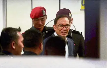  ?? — Bernama ?? Inquiry over: Anwar leaving the Palace of Justice after the RCI hearing in Putrajaya.