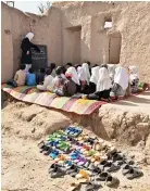  ??  ?? A makeshift community school for young boys and girls with a rugged structure and no roof. (Photo courtesy: Afghan Ministry of Education)