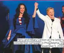  ??  ?? Perry and Hillary Clinton at the latter’s presidenti­al campaign in Philadelph­ia, on November 5, 2016.