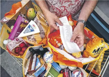  ?? PHOTOGRAPH: LINDA NYLIND/THE GUARDIAN ?? ▲ Shoppers are now less likely to ‘trade down’ to cheaper food but sales of expensive items remain sluggish