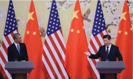 ?? FENG LI/GETTY IMAGES FILE PHOTO ?? Observers hope U.S. President Barack Obama, left, and Chinese President Xi Jinping will help broker a global deal on greenhouse gas reductions.