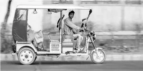  ??  ?? To ensure safety for commuters and the vehicle, the e-rickshaws ( pictured) would be GPS-enabled with certificat­ion from the Automotive Research Associatio­n of India, said Goldie Srivastava, co-founder and chief executive of Smart E