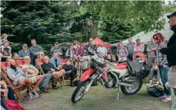  ??  ?? Chris Scott and Lois Pryce giving a talk on motorcycle prep.