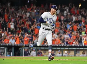  ?? Associated Press ?? Houston Astros' Carlos Correa rounds the bases Sunday after hitting a solo home run off Boston Red Sox starting pitcher David Price during the fifth inning of a baseball game in Houston.