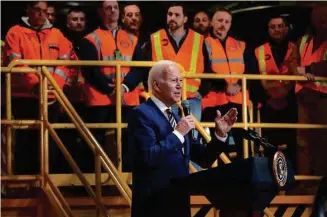  ?? John Minchillo/Associated Press ?? President Joe Biden speaks at the constructi­on site of the Hudson Tunnel Project on Tuesday in New York to showcase a $292 million mega grant that will be used to help build a rail tunnel beneath the Hudson River.