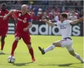  ?? CHRIS YOUNG/THE CANADIAN PRESS ?? TFC captain Michael Bradley, here against Chicago last week, says the Reds must maintain focus and not get distracted about making playoffs.