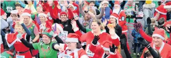  ??  ?? Runners prepare for the fifth Pontardawe Santa 5k run yesterday.