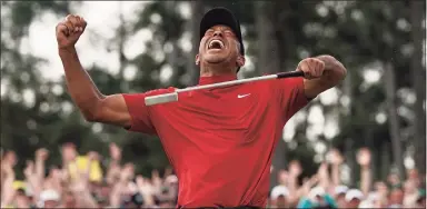  ?? David J. Phillip / Associated Press ?? Tiger Woods reacts after winning the 2019 Masters in Augusta, Ga. Because of the pandemic, the Masters is being held in November for the first time.