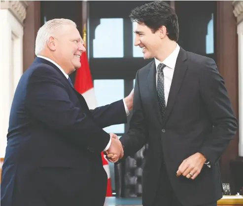  ?? Adrian Wyld / the cana dian press ?? Prime Minister Justin Trudeau greets Ontario Doug Ford at his office on Parliament Hill on Friday.