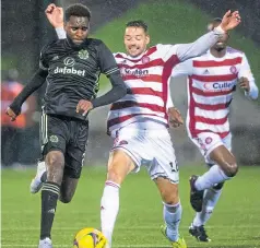  ??  ?? Celtic’s Odsonne Edouard in the thick of the action