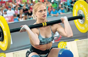  ?? Picture: GIRLSWITHM­USCLE.COM ?? WINNING LOOK: Annie Thorisdott­ir at the CrossFit games in 2012, which she won