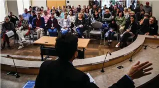  ??  ?? Dr. Ayaz Virji, 42, gives a lecture on Islam at City Hall in Granite Falls, Minn. Virji decided to give his third and last lecture after a librarian asked him to speak in Granite Falls, a town a half-hour away from his home in Dawson.