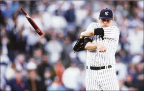  ?? Mike Stobe / Getty Images ?? The Yankees’ Michael King avoids a broken bat in the 11th inning against the Boston Red Sox at Yankee Stadium on Friday.