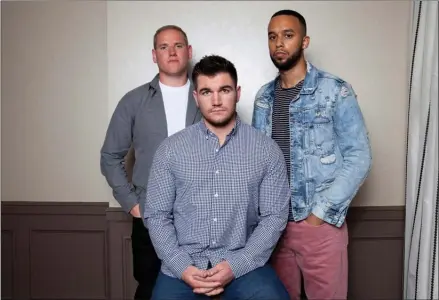  ?? The Associated Press ?? Spencer Stone, from left, Alek Skarlatos and Anthony Sadler pose for a portrait to promote the film 15:17 to Paris at the Four Seasons Hotel in Los Angeles.