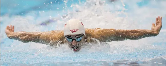  ?? DARREN STONE, TIMES COLONIST ?? Gamal Assaad of the Oakville Aquatic Club cruises to a fourth-place finish in the 50-metre butterfly at Saanich Commonweal­th Place on Thursday.