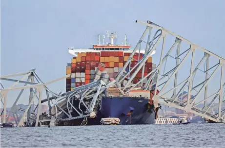  ?? Reuters ?? The Dali cargo vessel crashes into the Francis Scott Key Bridge in Baltimore, US, on Tuesday.