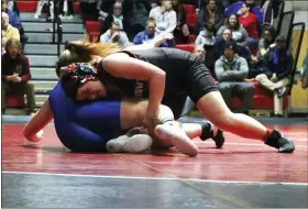  ?? EVAN WHEATON - MEDIANEWS GROUP ?? Boyertown’s Skylar Bohn competes against Exeter’s Haley Piersol during Boyertown’s first ever girls wrestling home meet in school history on Wednesday.