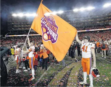  ?? [AP PHOTO] ?? Clemson players celebrate Monday after winning the NCAA college football playoff championsh­ip game against Alabama in Santa Clara, Calif. Clemson beat Alabama 44-16.