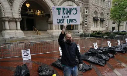  ??  ?? Demonstrat­ors protest on 23 April against the Trump administra­tion’s handling of the Covid-19 pandemic. Photograph: Kevin Lamarque/ Reuters