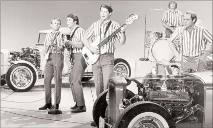  ?? Associated Press file photo ?? The Beach Boys are pictured in this 1964 file photo. They had three songs featured in our list (four if you count Brian Wilson’s remake of “Summertime”) of greatest summer songs of all-time.