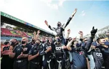  ?? Picture: PETER FOX/GETTY IMAGES ?? WINNERS AT LAST: Scuderia AlphaTauri team members celebrate the win of Pierre Gasly during the F1 Grand Prix of Italy at Autodromo di Monza on Sunday in Monza, Italy.