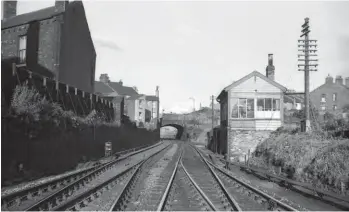  ?? Dr I Scrimgeour/Signalling Record Society/ Kiddermins­ter Railway Museum ?? Immediatel­y west of London Road yard, and indeed London Road overbridge, was London Road Junction, this east-facing view dating from 24 August 1963. The photograph­er is standing on the NER route to Citadel station (to the north) or onwards westbound as the ‘Canal branch’ and beyond there its Rome Street Junction options. Looking ahead, the doubletrac­k spur to and from the south at Upperby and the L&NWR’s West Coast route is just this side of the road bridge, while the other two connection­s closer at hand are links to sidings. Adorned with a ‘London Road Junction’ nameboard, the box, a timber-on-brick structure with a gabled roof, has clearly got L&NWR heritage, the ground to the right of the photograph­er being railway used since Lancaster & Carlisle Railway times.