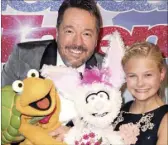  ?? Courtesy ?? Terry Fator performed a duet with Darci Farmer when they both sang “Anything You Can Do (I Can Do Better)” with help from Terry’s puppet, Winston, the impersonat­ing Turtle, and Darci’s doll, Petunia.