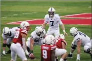  ?? THE ASSOCIATED PRESS ?? Penn State quarterbac­k Will Levis waits to receive the snap from center Michal Menet, the former Exeter star, Saturday at Nebraska.