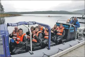  ??  ?? A group of holidaymak­ers set off on a tour. 17_t30sealife­01