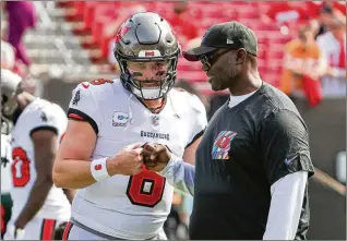  ?? DOUGLAS R. CLIFFORD/TAMPA BAY TIMES/TNS 2023 ?? Baker Mayfield’s return was among a handful of personnel decisions that should make life easier for coach Todd Bowles. Wide receiver Mike Evans and safety Antoine Winfield Jr. also will be back to help the Bucs defend their NFC South title.