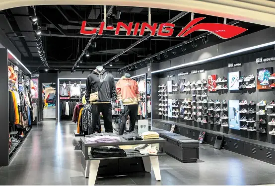  ?? — IC ?? A store of Chinese sportswear brand Li-Ning. Running shoes made in China are outperform­ing the competitio­n in the domestic market, according to statistics released in March 2021 by Joyrun, one of China’s leading sports-data platforms.