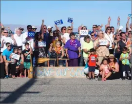  ??  ?? Members of the community came together to take a photo just a few feet away from the Salton Sea shoreline to urge the state to get more engaged in the Salton Sea restoratio­n in April 2017. EDWIN DELGADO FILE PHOTO