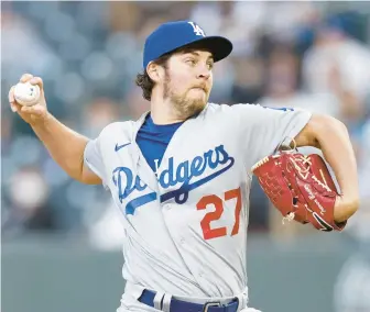  ?? EDMONDS/GETTY
JUSTIN ?? The Dodgers officially released pitcher Trevor Bauer on Jan. 12, 2022, six days after designatin­g him for assignment.