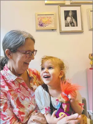  ?? (Courtesy Photo/Elisa Pupko) ?? Mary Pupko laughs with her granddaugh­ter Evelyn. Pupko, a 64-year-old retired seamstress with multiple sclerosis, moved to Brooklyn from Seattle to be closer to her family.