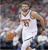  ?? FE ?? Jamal Murray tuvo también ocho rebotes y siete asistencia­s para los Nuggets.