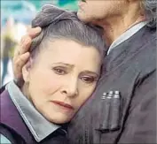  ?? Disney / Lucasfilms ?? CARRIE FISHER as Leia Organa Solo and Harrison Ford as Han Solo in “Star Wars: The Force Awakens.”