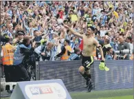  ??  ?? HAPPY MEMORIES: Huddersfie­ld Town’s Christophe­r Schindler celebrates winning the penalty shoot-out at Wembley last May.