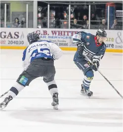  ?? Picture: Derek Black. ?? Tyler Brickler, right, goes one-on-one with Paul Phillips of Milton Keynes Lightning.