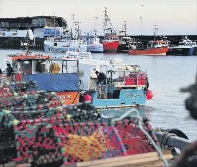  ??  ?? CHANGING EUROPE: The report has called for an assessment of how fishing communitie­s such as Bridlingto­n, above, will be affected.