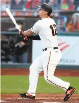  ?? Scott Strazzante / The Chronicle ?? Outfielder Alex Dickerson will receive $ 2.1 million from the Giants next season.