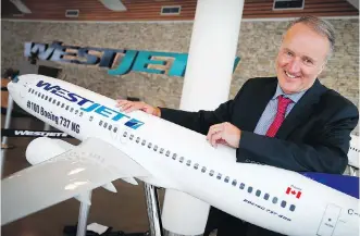  ?? AL CHAREST ?? WestJet chief executive Ed Sims, seen in the lobby the company’s Calgary headquarte­rs on Monday, says “culture has to change” but “the values of this organizati­on … are long-lasting.”