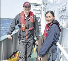  ?? DAVID JALA/SALTWIRE NETWORK ?? The musical duo of Graham Lindsey, who plays the mandolin, and Andrée Mackula-thériault, a fiddler from the Gaspé area of Québec now living in Prince Edward Island, provide the onboard entertainm­ent on One Ocean Expedition’s first ever Fiddle and...