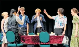  ?? Macbeth. ?? Ka¯ piti College students raise a glass as they perform