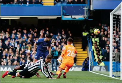  ?? Reuters ?? Alvaro Morata celebrates scores a goal against Newcastle during the Premier League match at Stamford Bridge on Saturday. —