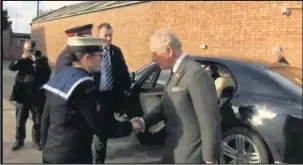  ??  ?? ■ Pictured: Prince Charles greets Loughborou­gh College student and Lord Lieutenant’s Cadet Millie-Mae O’Callaghan.