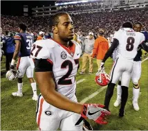  ?? BOB ANDRES / BANDRES@AJC.COM ?? Running back Nick Chubb leaves the field after Georgia’s 40-17 loss at Auburn. Chubb rushed for 27 yards and a touchdown on 11 carries.