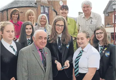  ?? Picture: Kim Cessford. ?? From left, front: Ellie Smith, Kristen Baxter, Angus Provost Ronnie Proctor, Victoria Johnston, who proposed the app, Chatrina Fraser and Emily Lindley; back: head teacher Jane Esson, computing sciences teacher Rachel Malecki, youth worker Angie Doig,...